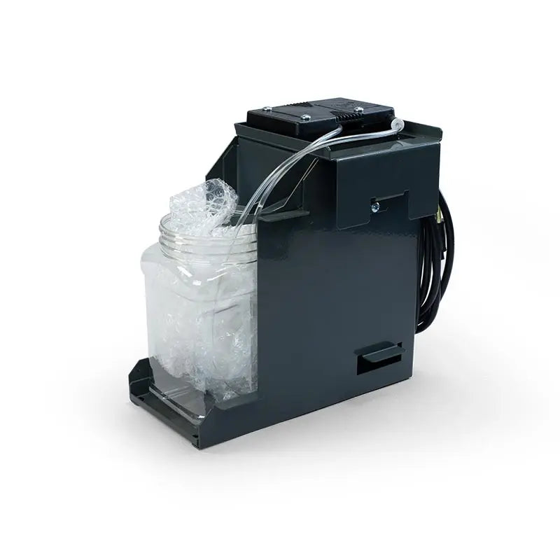 Zebra Style Haas coolant oil skimmer mounted on a Haas external coolant tank